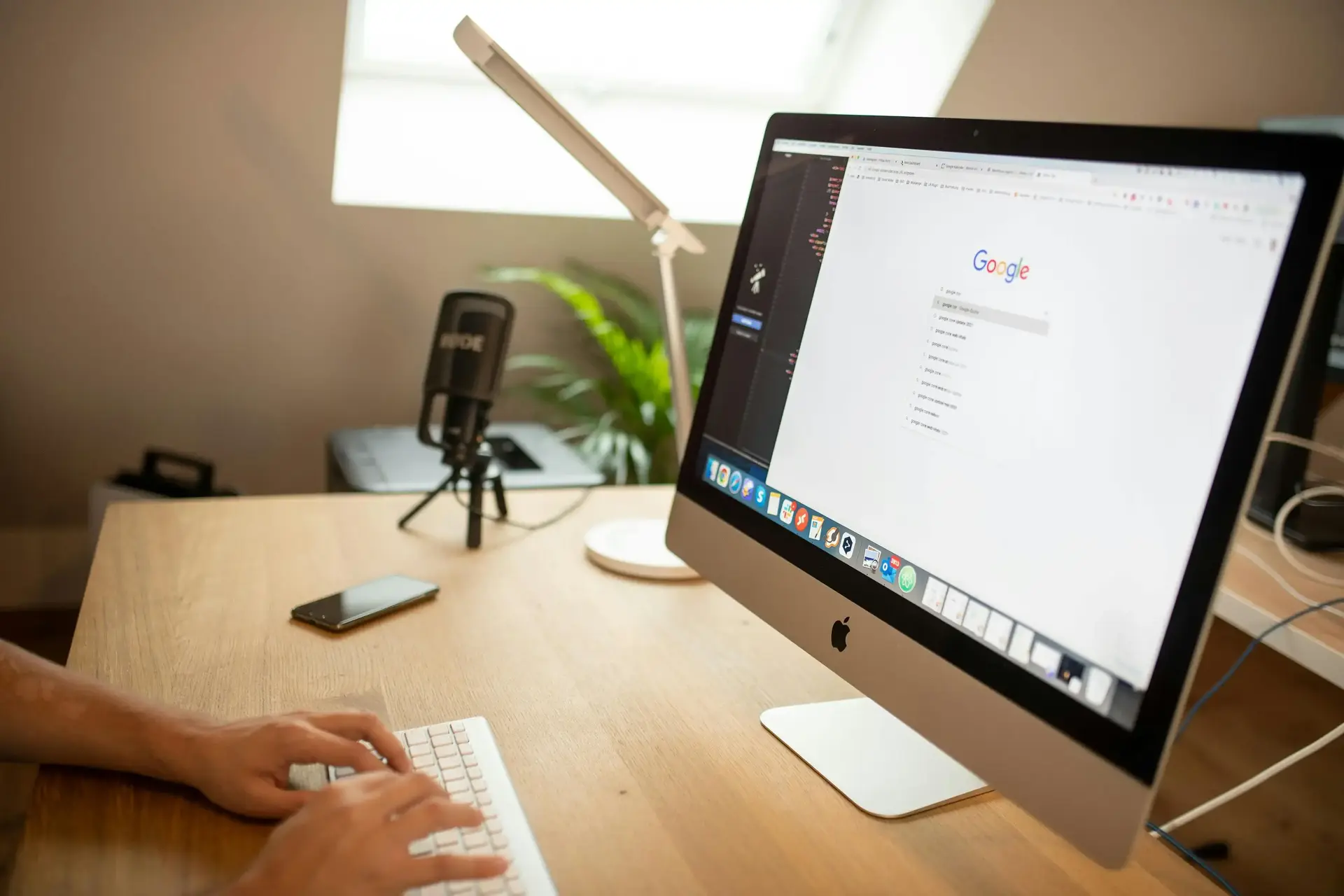 Person making a Google search on their computer